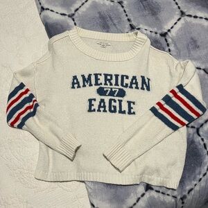 American Eagle Outfitters White Sweater with Red and Blue Sleeve Stripes